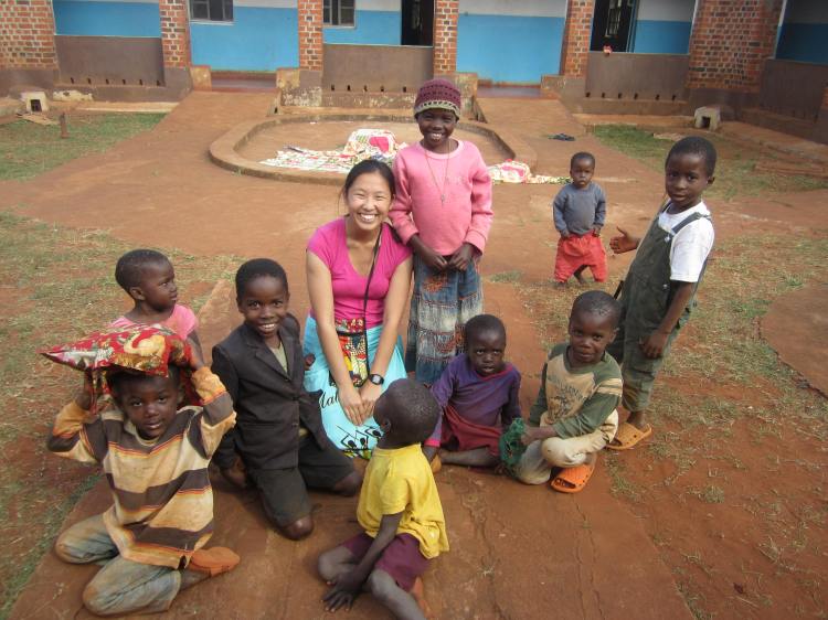 Amy Pollard spends time with some of the orphans.