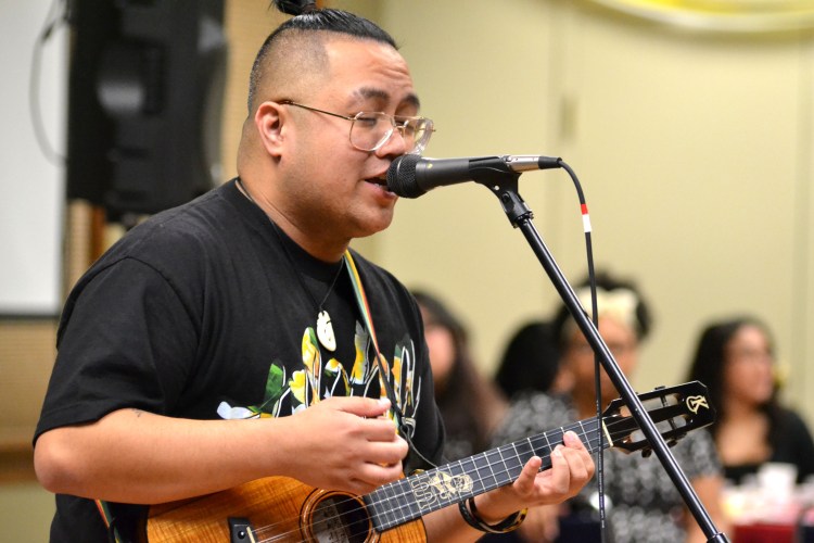 Gutierrez delights the crowd with his singing.