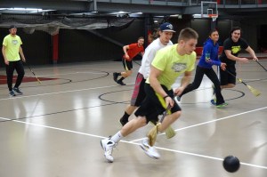 Students running on the court during one of the games!